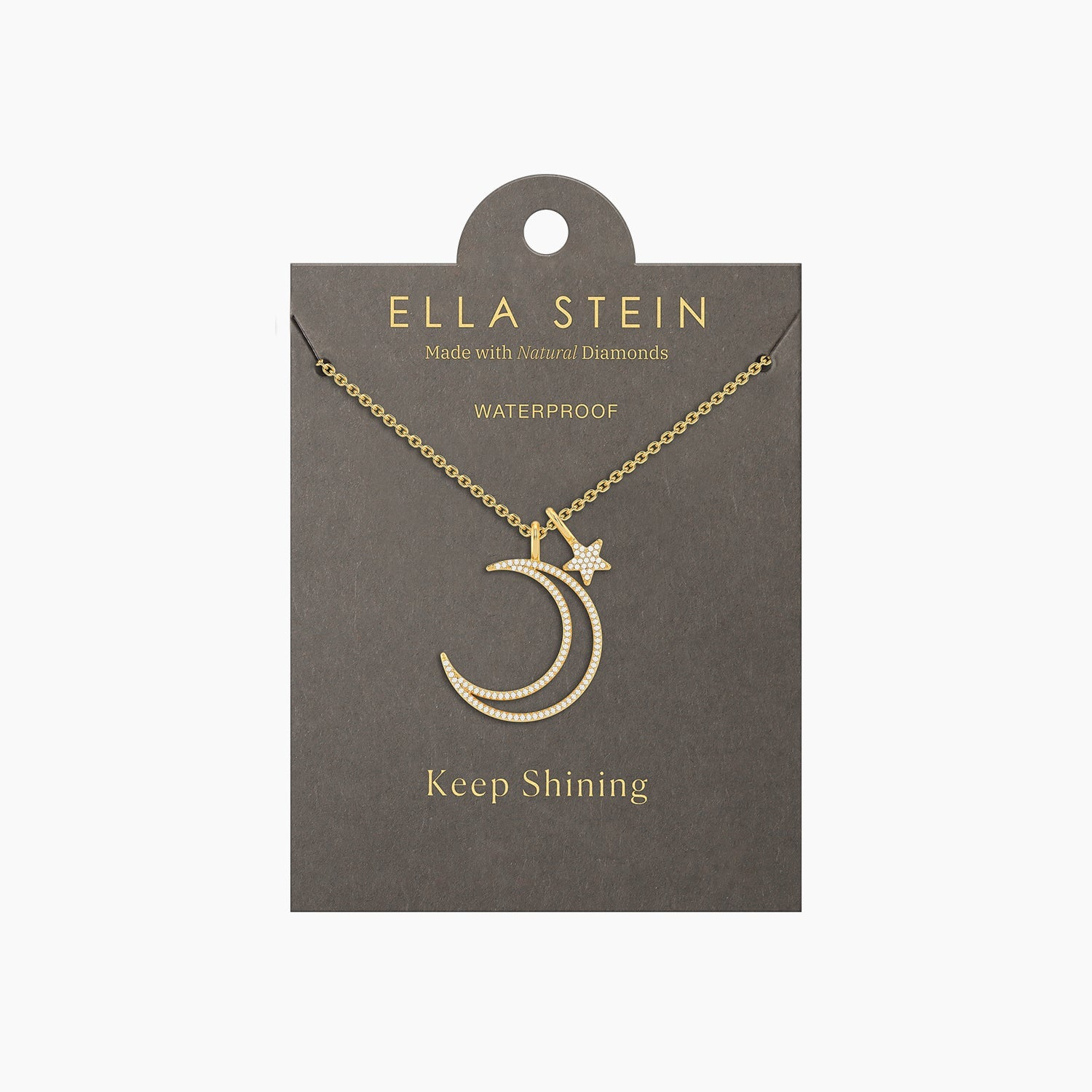 Gold crescent moon and star pendant necklace with natural diamonds on a grey display card.