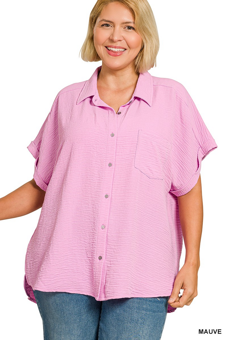 Plus size mauve pink woven airflow button-down shirt with short sleeves and a chest pocket.