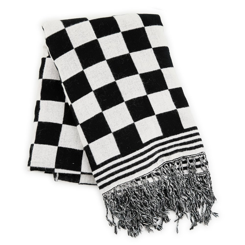 Black and white checkered acrylic throw blanket with fringed edges.