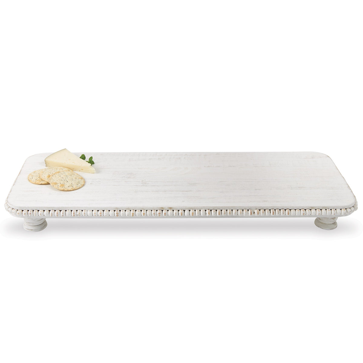 Large white-washed mango wood footed serving board with a beaded rim, cheese, and crackers.
