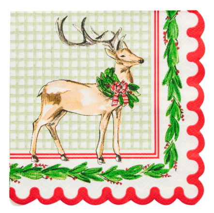 5-inch cocktail napkin featuring a deer with a wreath and red bow on a green grid background.
