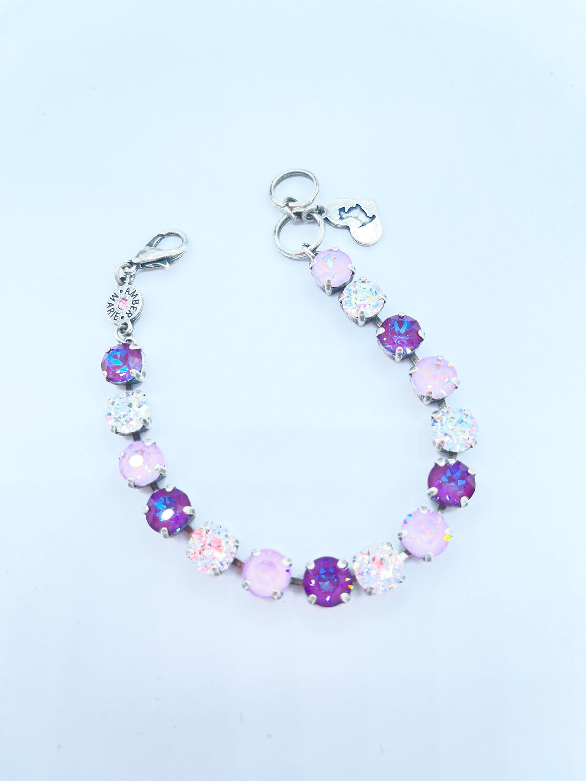 Classic Paris bracelet in lavender, lilac, white, and light green stones with an amber tag heart charm.