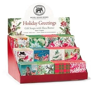 Display stand of Michel Design Works Holiday Greetings small soaps with various festive designs.