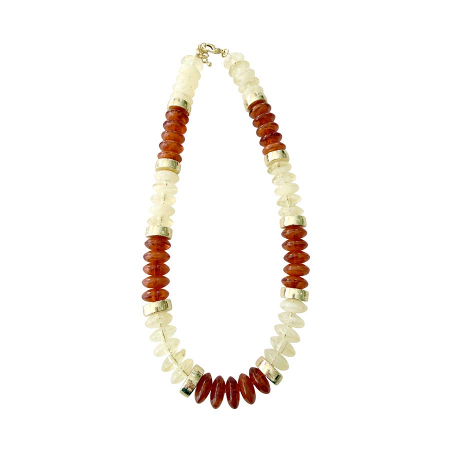 Calloway Beaded Disc Necklace featuring alternating amber and clear translucent disc-shaped beads.