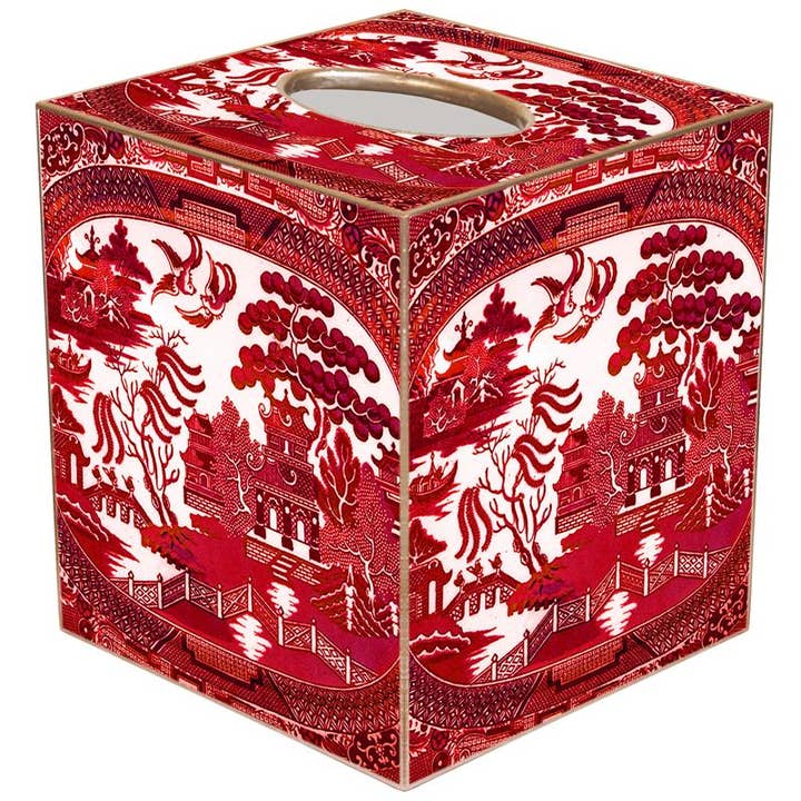 Hand-cut paper mache tissue box cover with gold-painted edges.