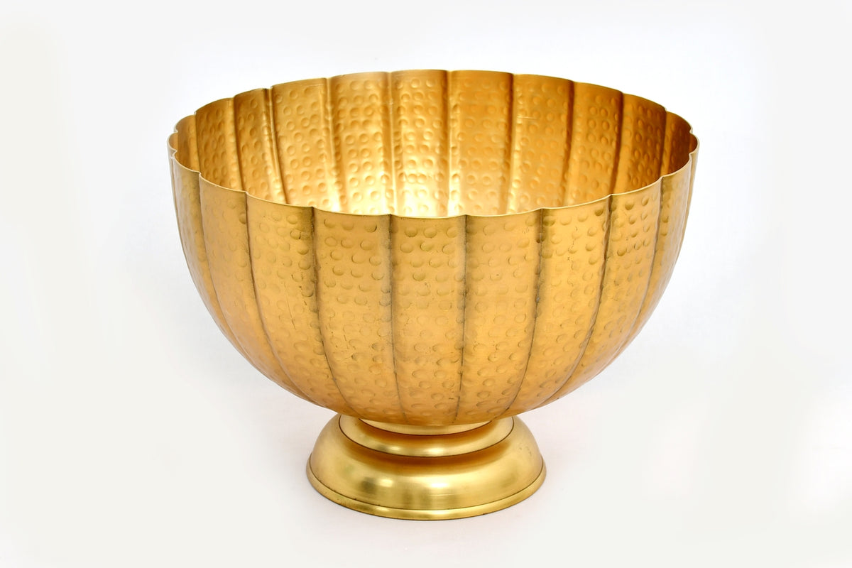 Gold hammered aluminum pedestal bowl with grooved detailing
