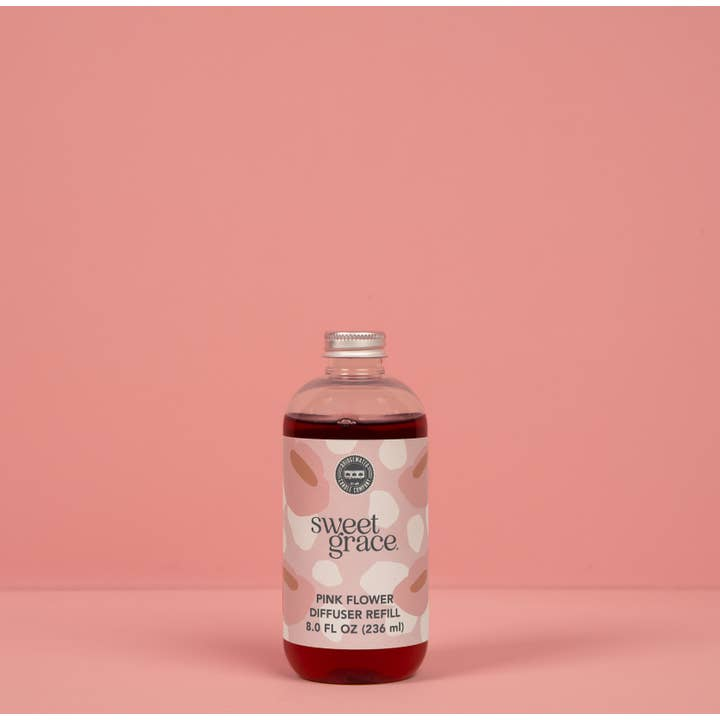 Sweet Grace Pink Flower Diffuser Refill bottle with 8.0 FL OZ of dark red fragrance oil.
