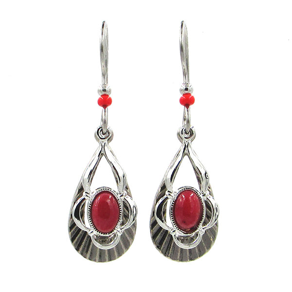 Silver open teardrop earrings with red oval stones and red bead accents.