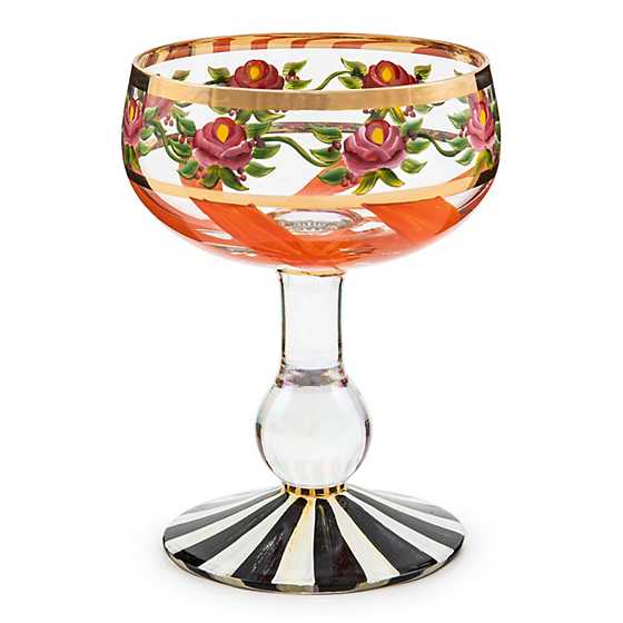 Hand-painted Maypole Coupe glass with green ribbon swirls, pink roses on a pearlescent stem and gold lustre trim.