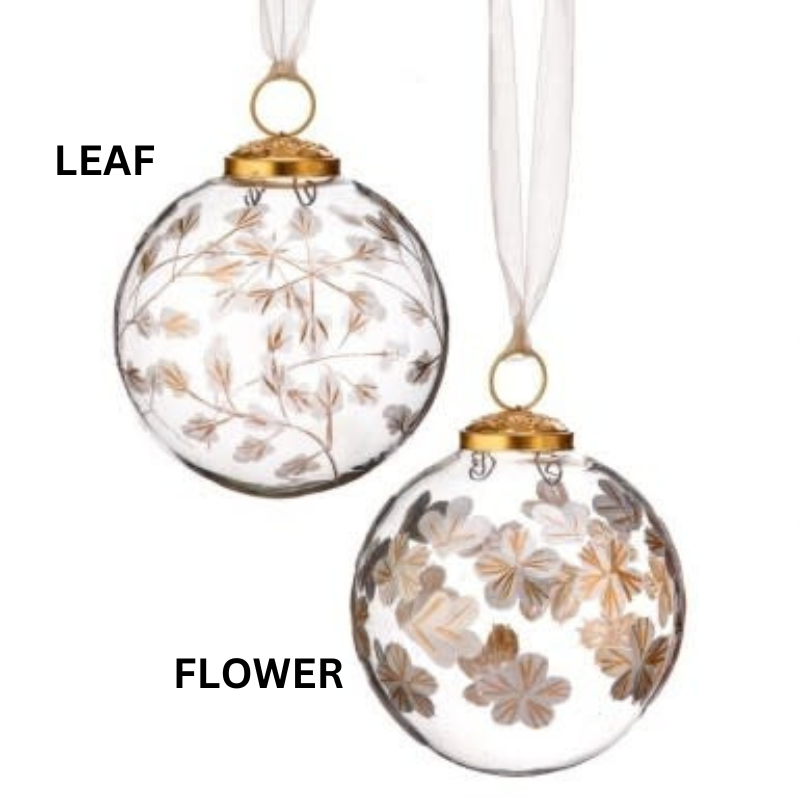 Two clear glass ball ornaments with gold etched leaf and flower patterns and gold hanging caps.