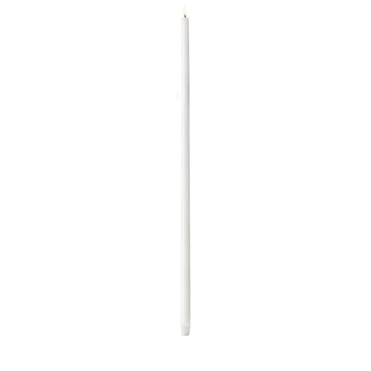 Tall Nordic white LED taper candle with smooth finish standing upright