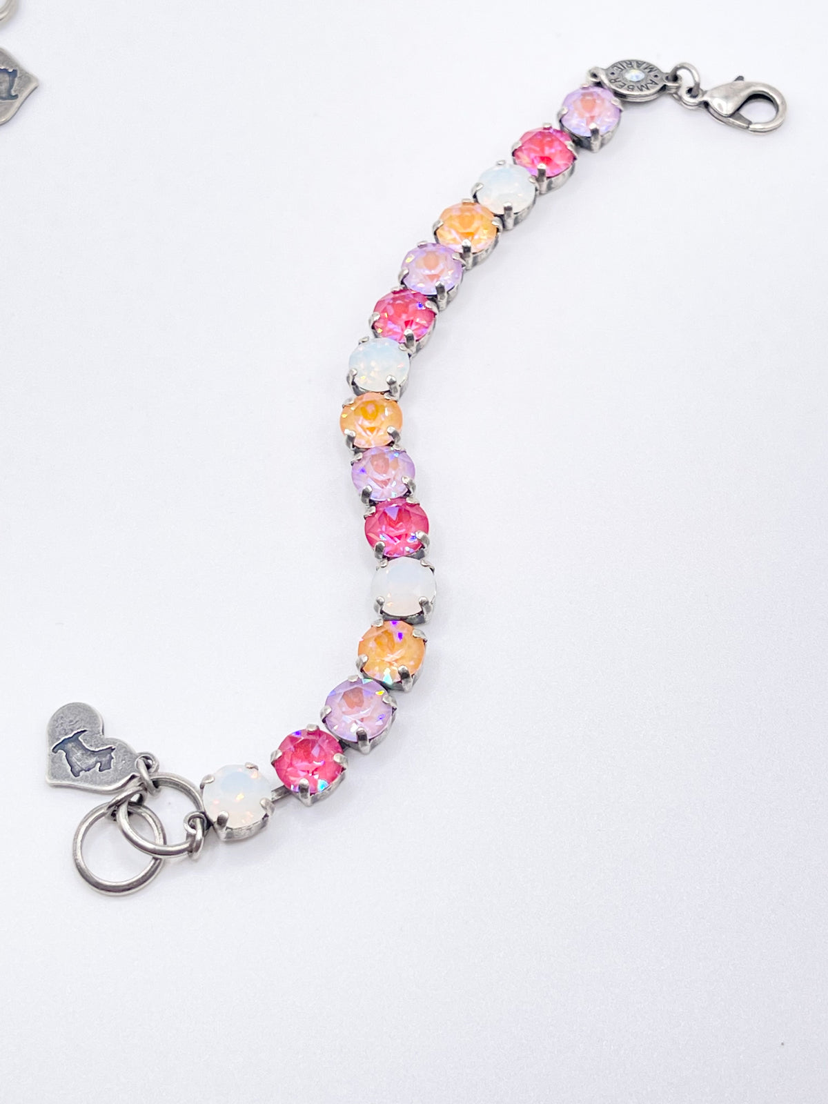 Adjustable silver-tone bracelet featuring a Scotty dog heart charm