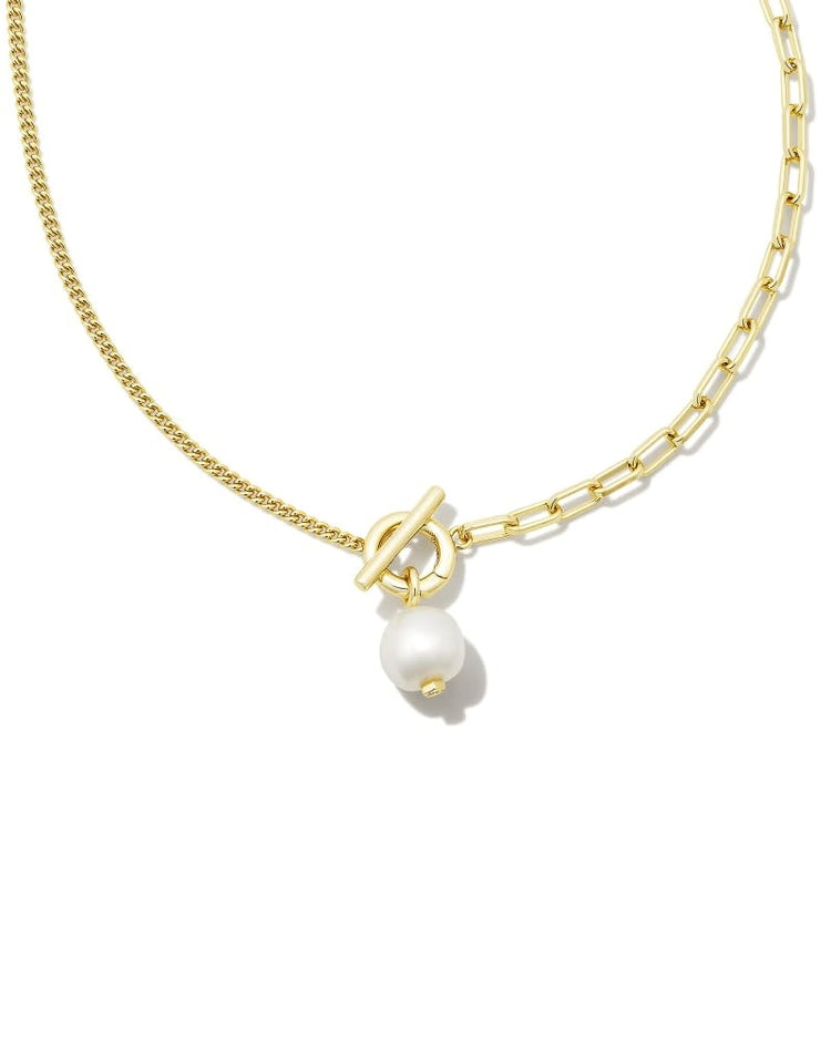 Convertible gold necklace with a removable white freshwater pearl pendant on a mixed-link chain.