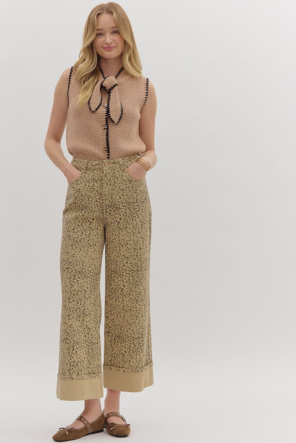 Tan leopard print woven high-waist wide-leg pants with front patch pockets.