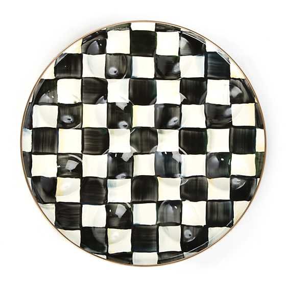 Courtly Check Enamel Egg Plate with a black and white hand-painted checkered pattern.