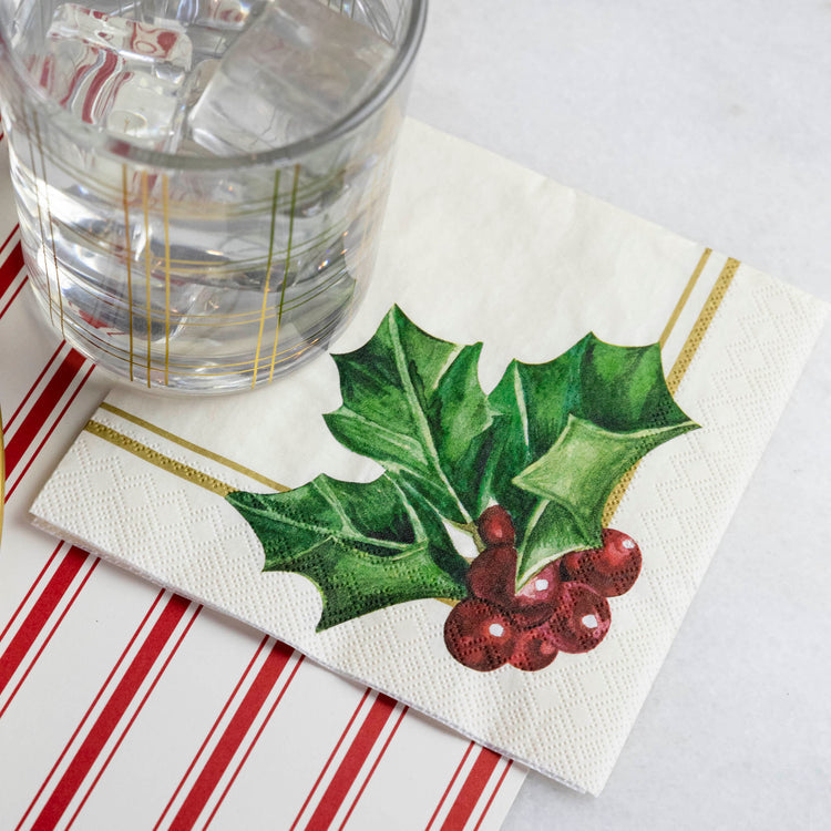 Packaged Holly cocktail napkins in a folded stack with scalloped edges.