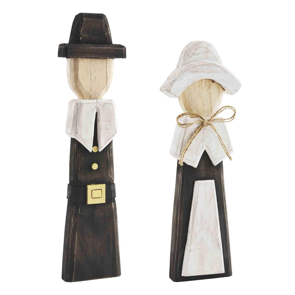 Hand-painted pine wood Pilgrim Sitter figurine with distressed chiseled texture and natural finish.