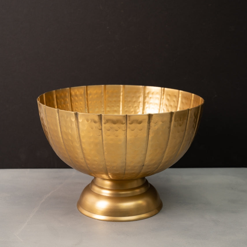 Gold hammered pedestal bowl with grooved detailing