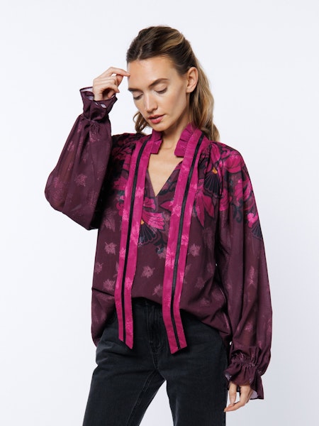 Kim floral engineered print blouse with a relaxed fit.