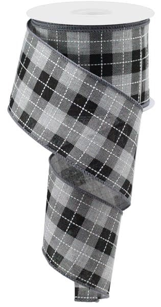 A spool of 2.5-inch wide black, grey, and white buffalo check patterned wired ribbon.