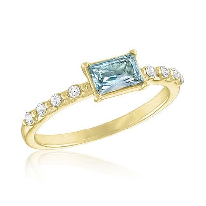 Stacked gold rings with light sapphire rectangular stones in a layered rectangle silhouette.