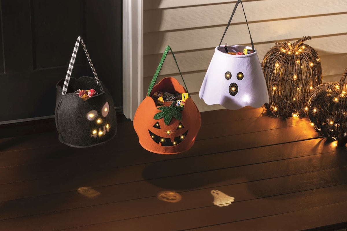 Felt trick-or-treat bucket with LED face projection