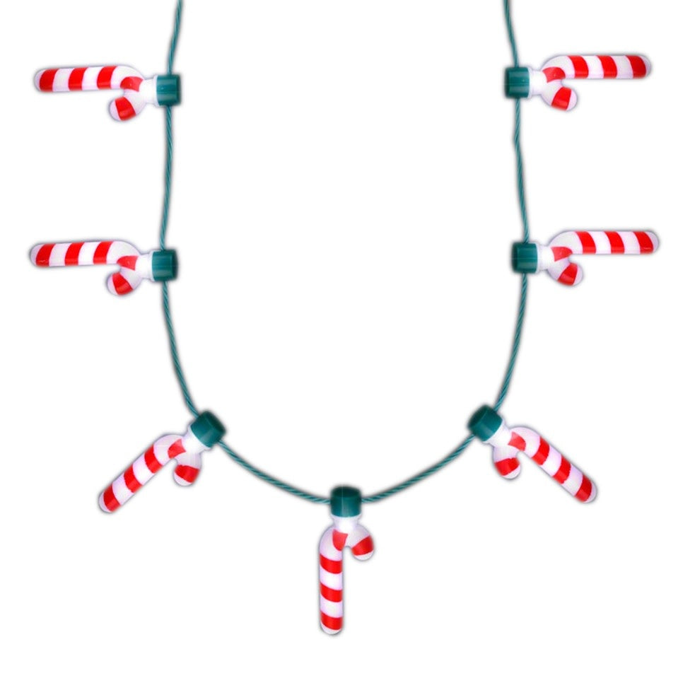 Green string necklace with seven white candy cane charms featuring internal bright white LED lights.