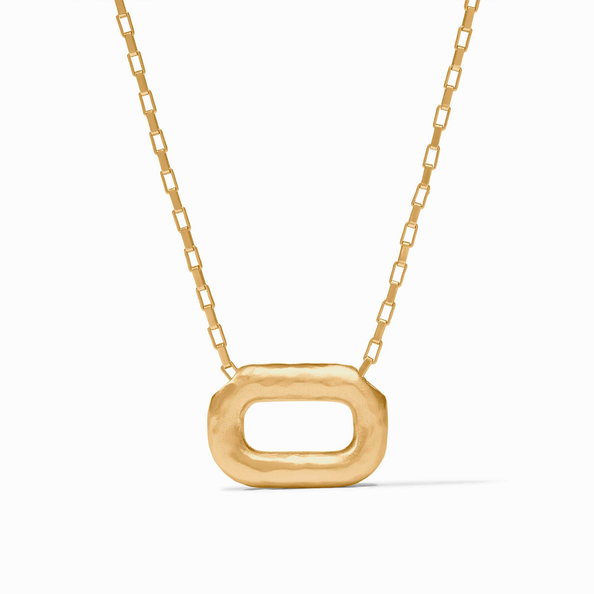 Sahara Delicate Necklace in 24K gold plate with a hammered oval pendant on a box chain.