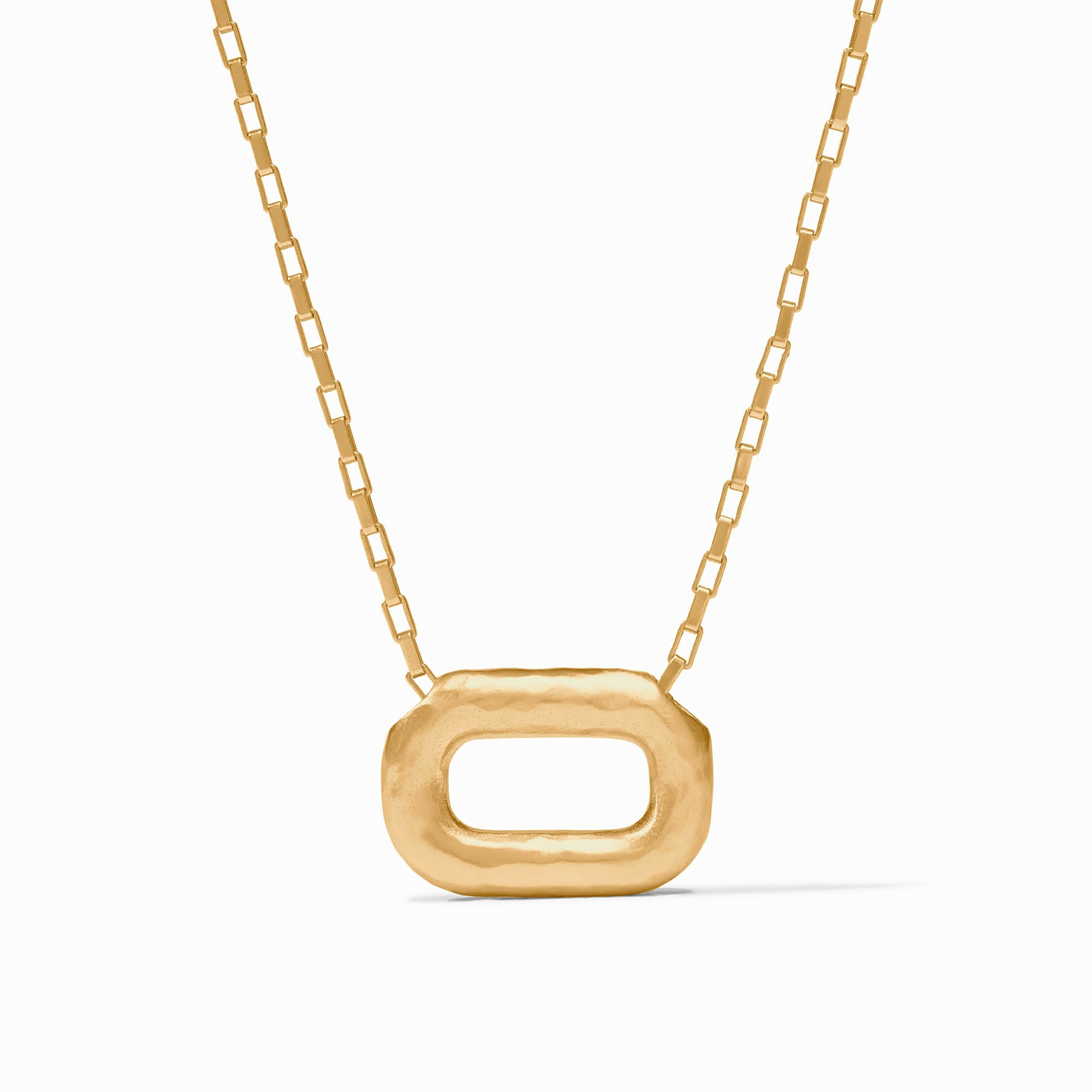 Sahara Delicate Necklace in 24K gold plate with a hammered oval pendant on a box chain.