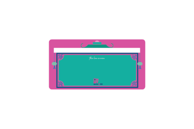 Pink plastic Mahjong line finder with a clear window showing the tile's character.