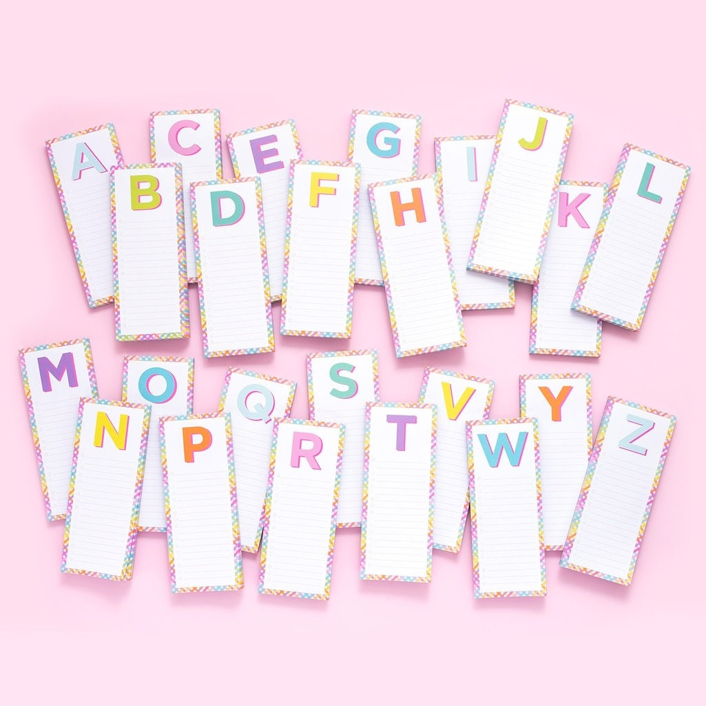 4-inch by 10-inch lined letter pad with alphabet list on front.