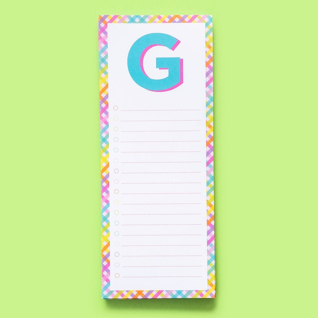 Four-inch by ten-inch lined letter pad with magnet on back in shrink-wrap packaging