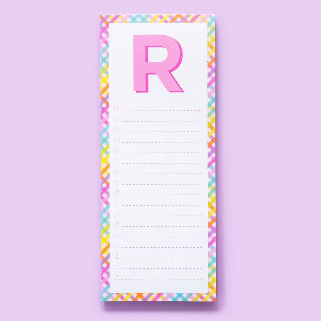 List Pad Letters: a stack of four-inch by ten-inch lined notepads with magnets on the back.