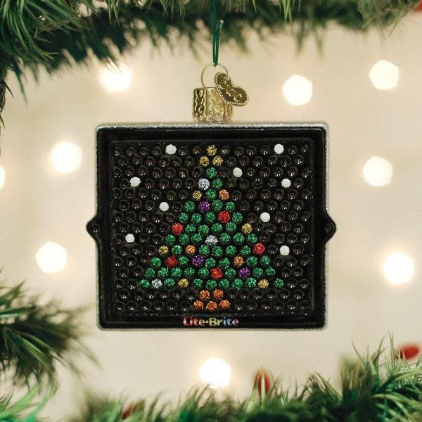 Hand-crafted glass Lite Brite ornament featuring colorful pegs on a light-up grid with neon-style design templates.