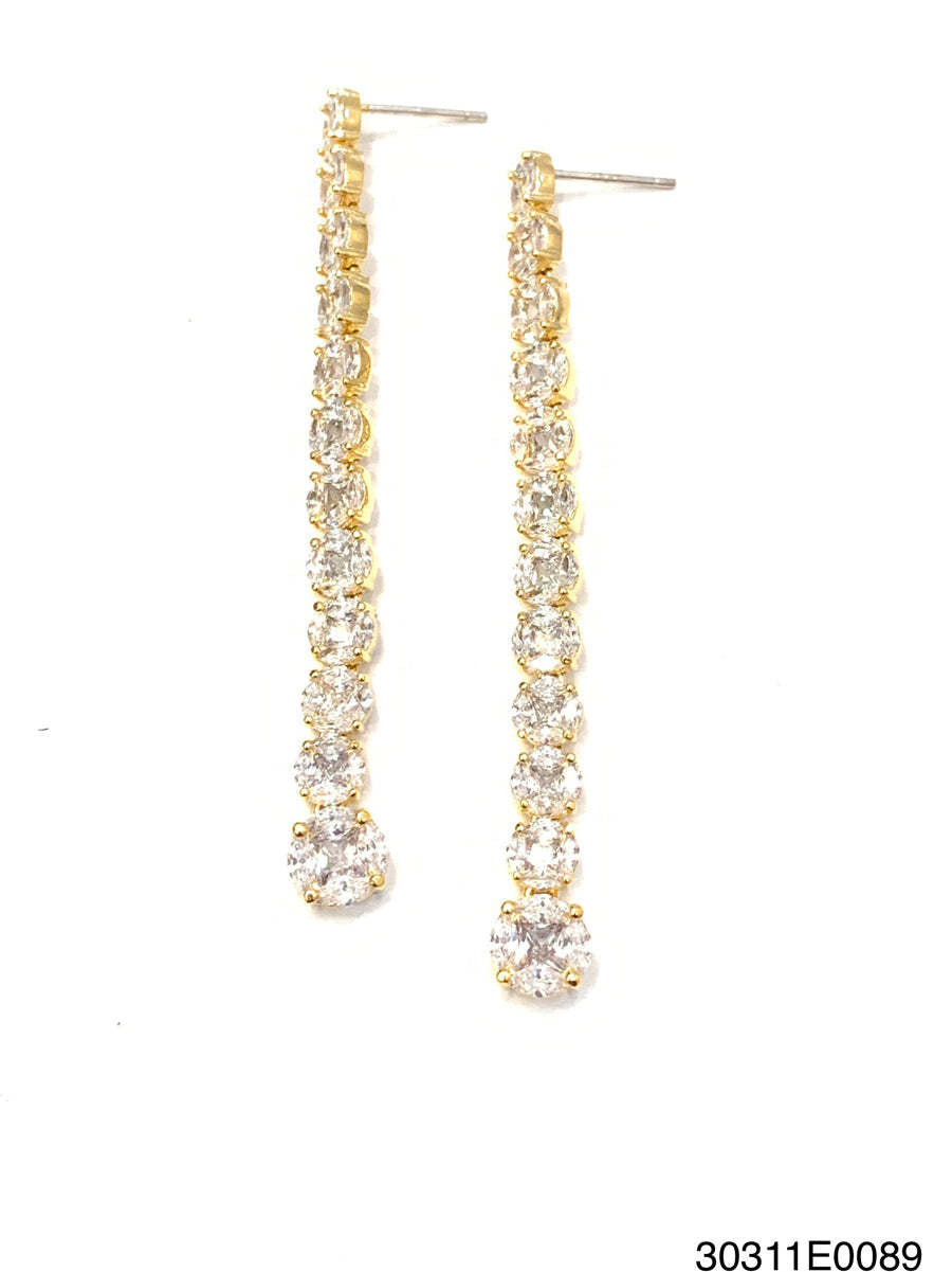 Gold linear drop earrings featuring princess-cut centers with marquise-cut cubic zirconia accents.