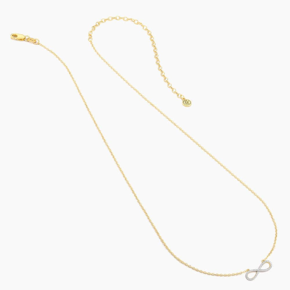 Silver infinity pendant necklace with a small diamond on an 18-inch chain.