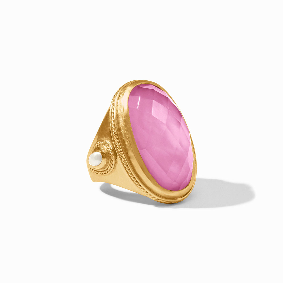 Gold-plated Cannes statement ring featuring a pear-shaped gemstone with mother-of-pearl accents and twisted wire detail.