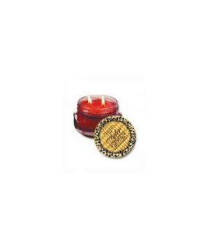 An 11oz red wax candle in a glass jar with a leopard print lid.