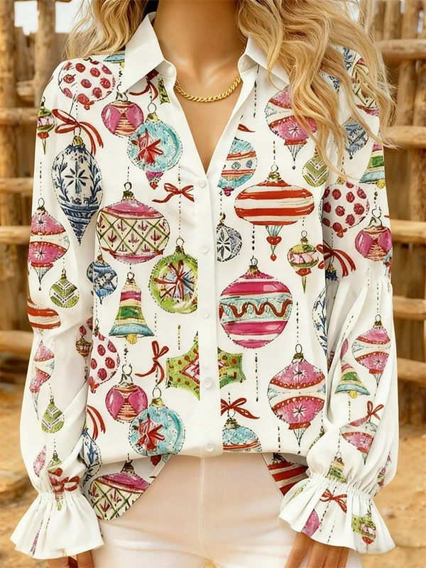 White collared puff sleeve top with Christmas ornament print on a cotton blend fabric.