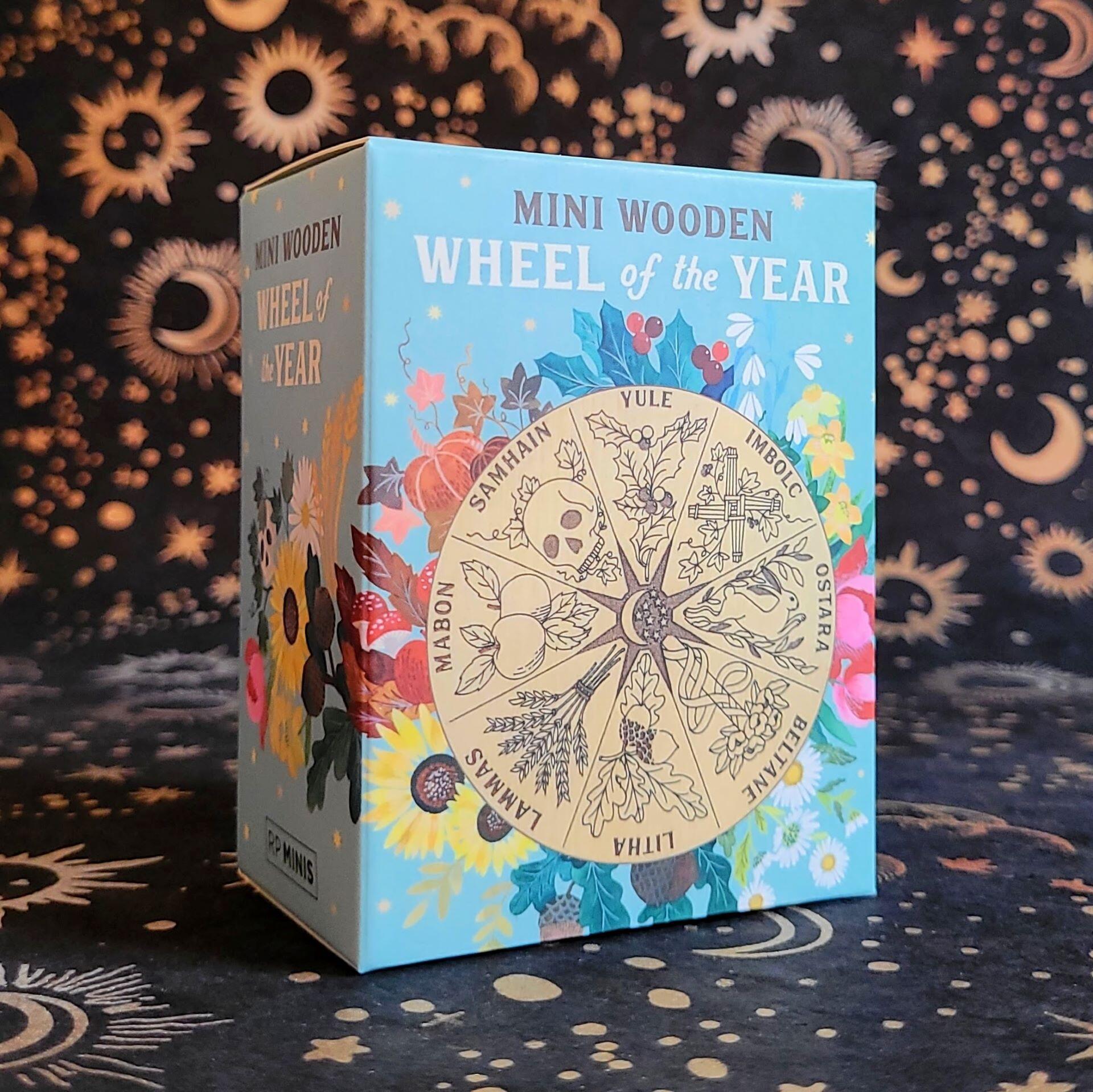 Solid wood Wheel of the Year with laser-etched mystical holidays on a circular silhouette.