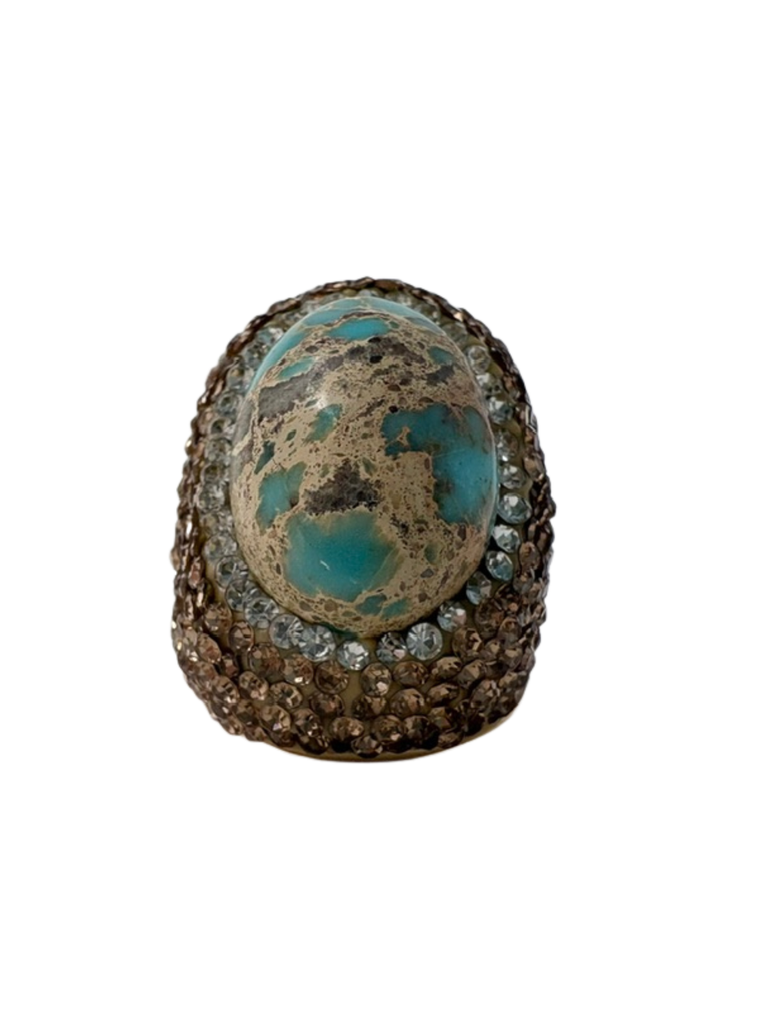 Queen of Sheba fashion ring featuring a large oval turquoise stone surrounded by brown crystals.