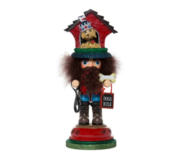 Wooden dog house hat nutcracker holding a black leash on a food-bowl base