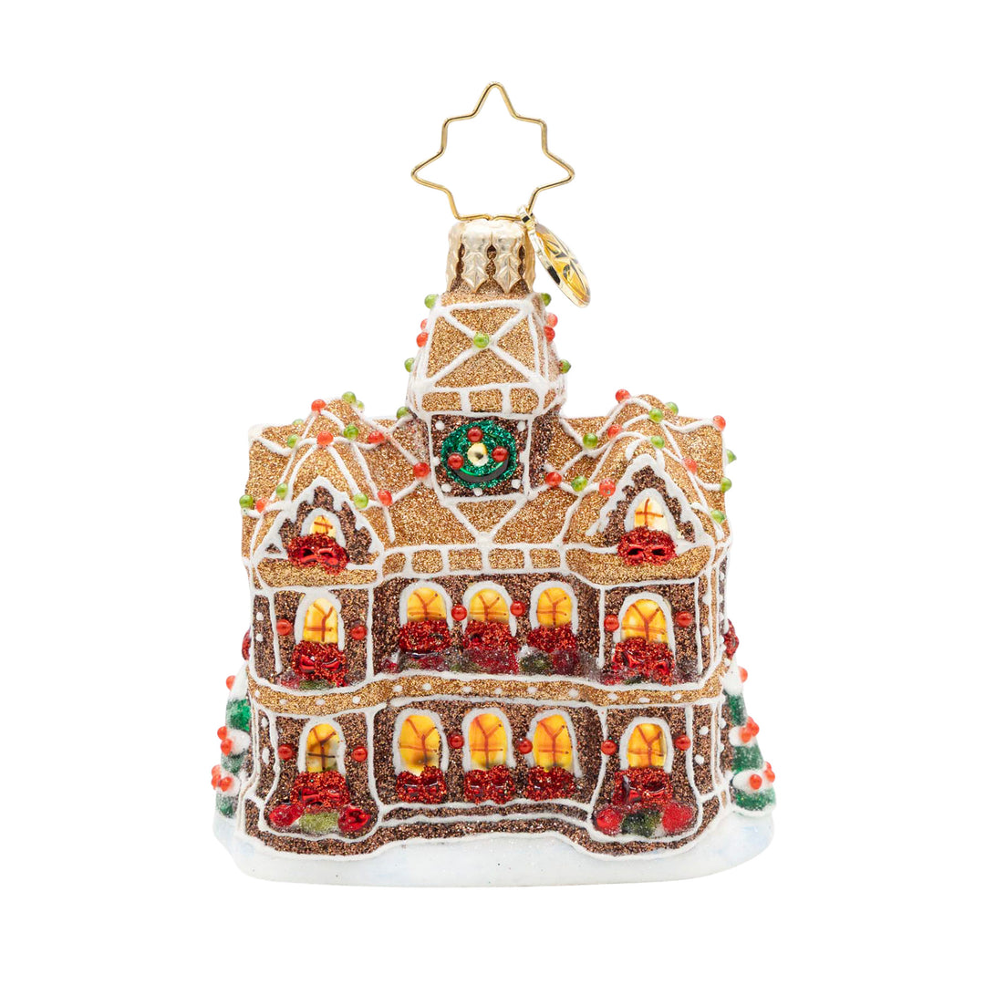 Gingerbread Manor Gem glass ornament with glitter, candy accents, and a star-shaped hanger.
