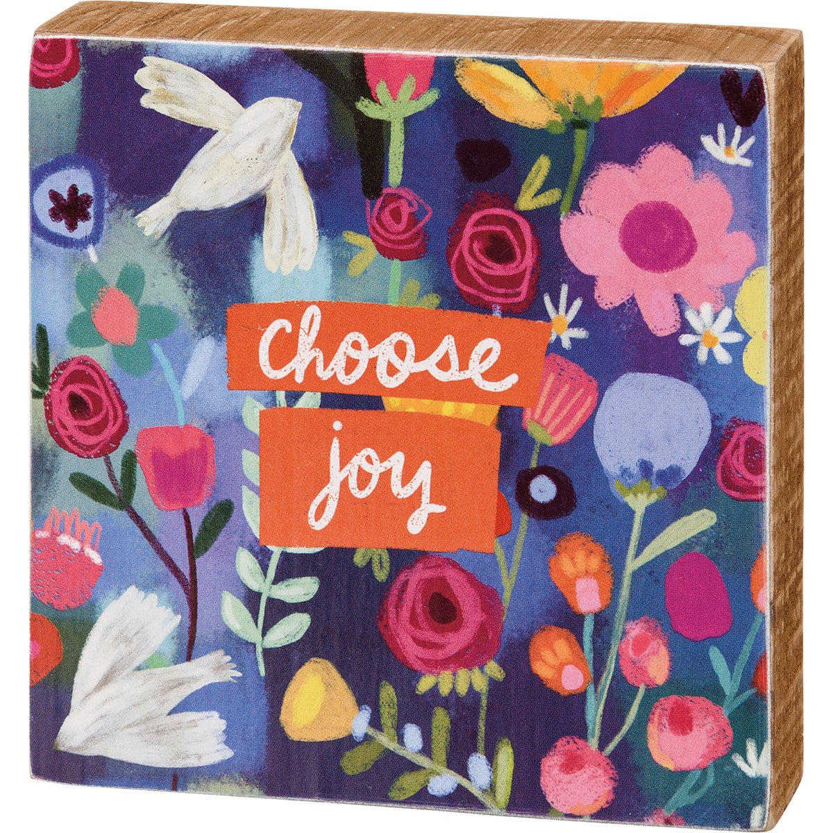 Wooden box sign with a floral pattern and the words "Choose joy" in white script on orange banners.