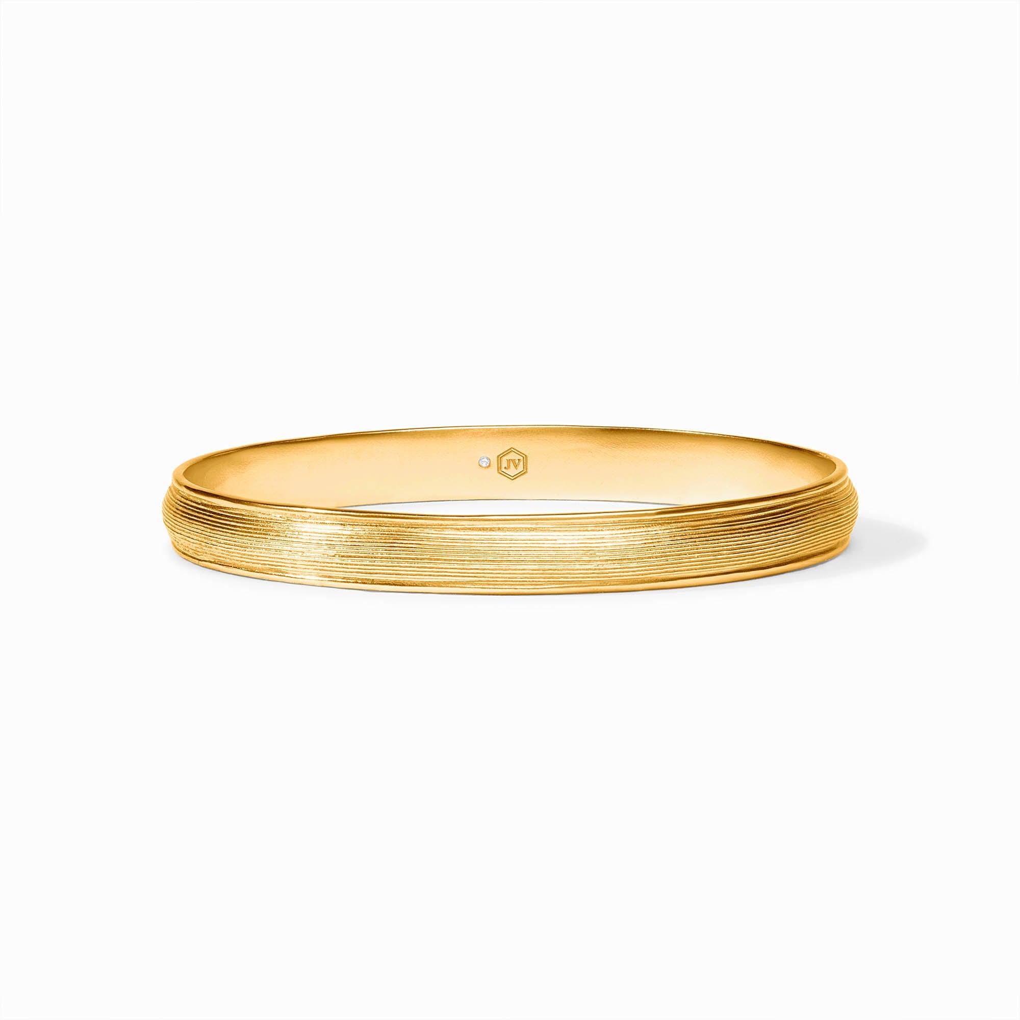 Cobblestone Stacking Bangle in 24K gold plate with a textured, lined exterior and hallmark.