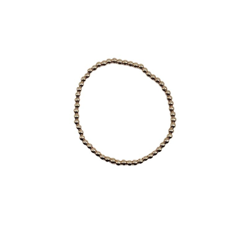 Small water-resistant bead bracelet with a simple round link chain in neutral tone.