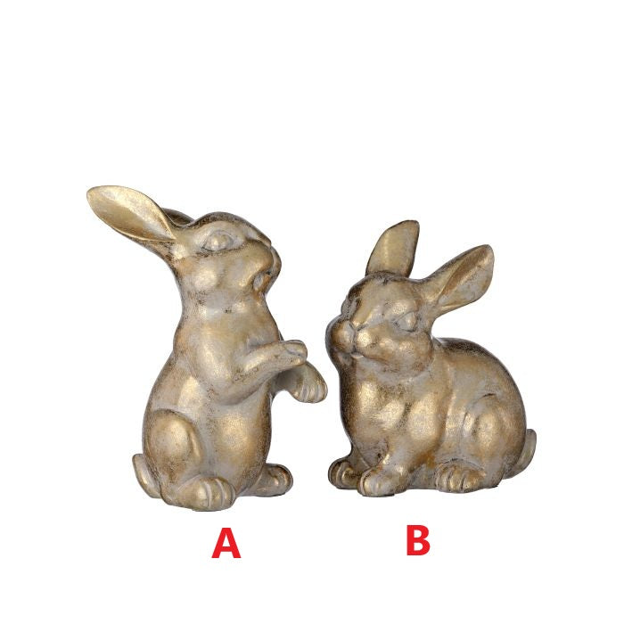 Resin golden bunny figurine with a smooth metallic finish.