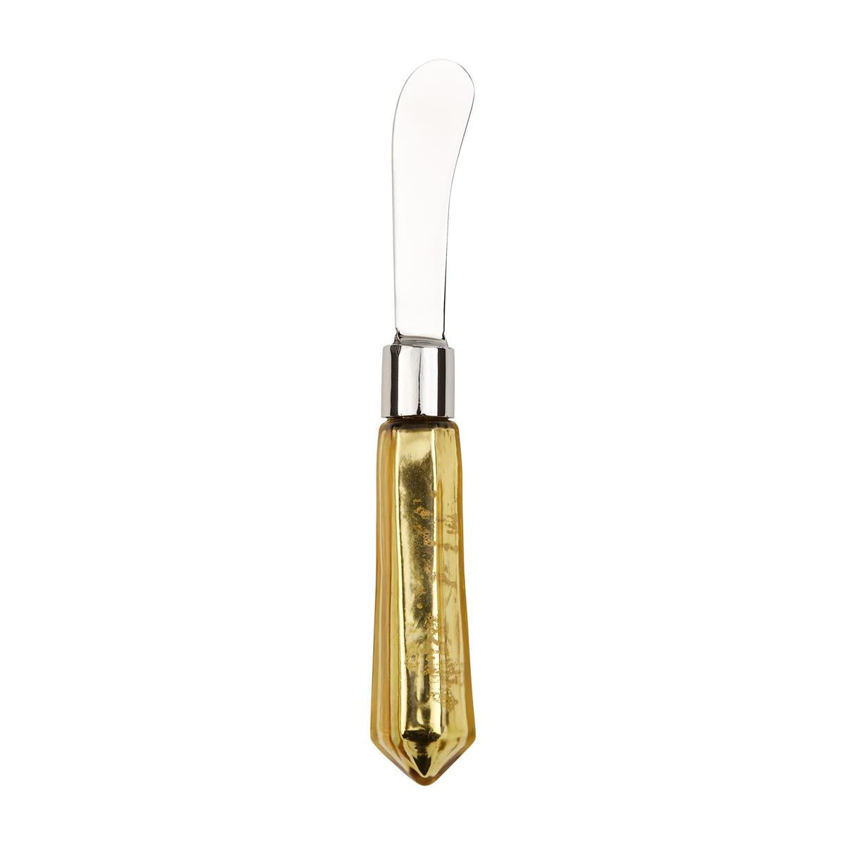 Metallic spreader with a silver blade and a faceted gold-colored handle.
