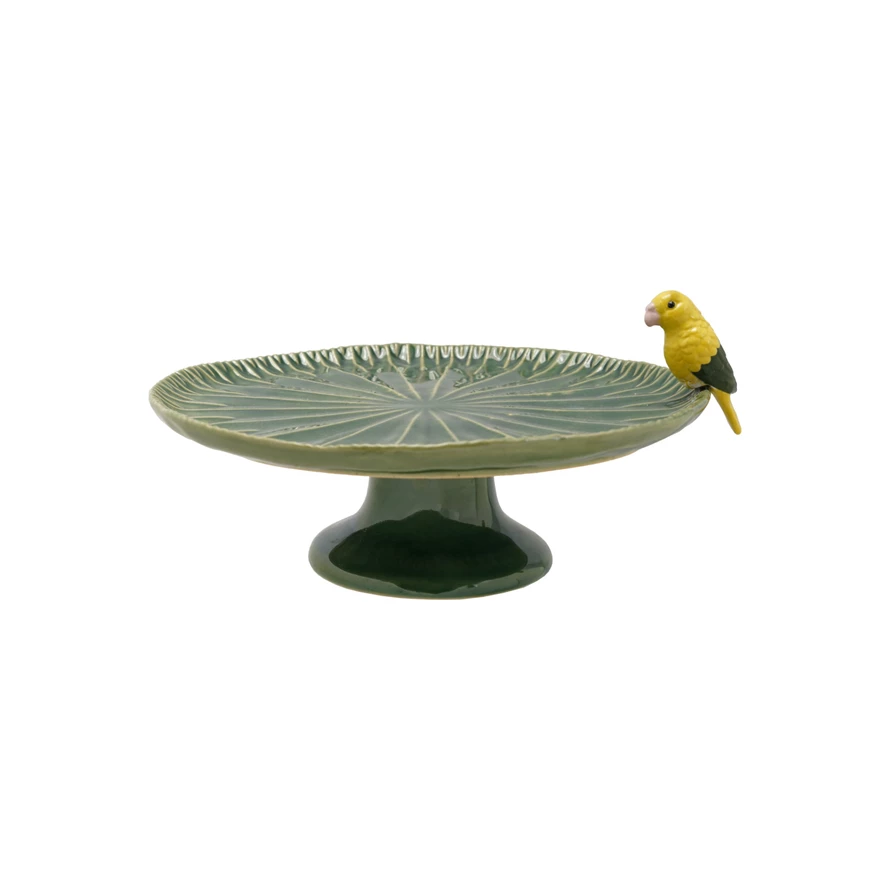 Green stoneware pedestal with yellow 3D bird sculpture on top