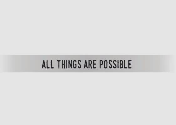Silver bracelet with the engraved text "ALL THINGS ARE POSSIBLE".